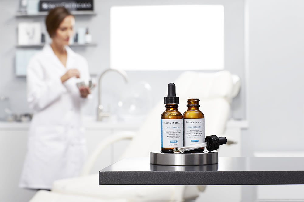Skinceuticals - products on table, lab tech in the background